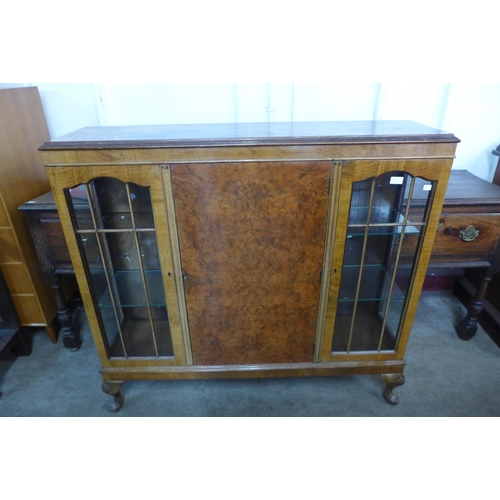 127 - A burr walnut display cabinet