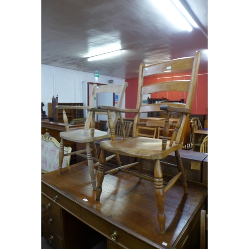 135 - Two Victorian beech farmhouse armchairs