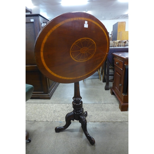 145 - A Victorian inlaid mahogany oval tilt-top tripod table