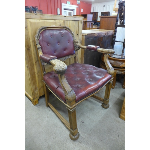 146 - A 19th Century Italian carved walnut and red leather library chair