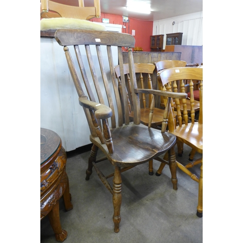 151 - A Victorian elm and beech farmhouse armchair