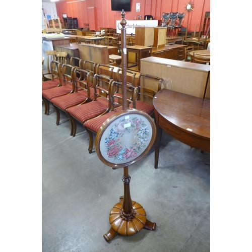 155 - A Victorian rosewood polescreen