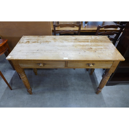 161 - A Victorian pine two drawer kitchen serving table