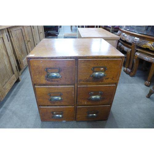 165 - An early 20th Century oak six drawer index cabinet