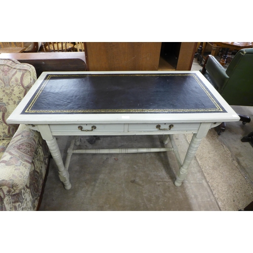 193 - A Victorian painted mahogany two drawer writing table