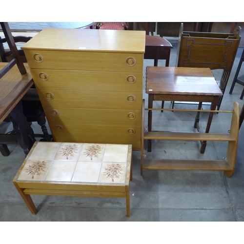 200 - A teak chest of drawers, an oak occasional table and two others