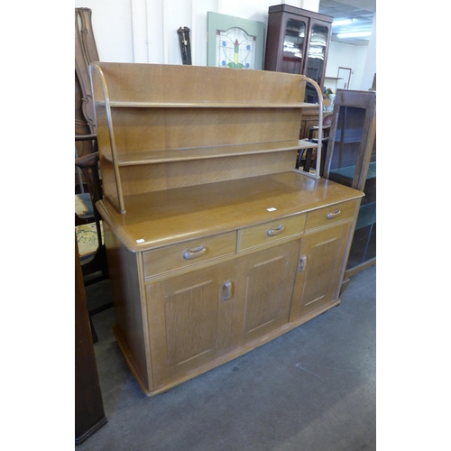 208 - A Priory oak sideboard