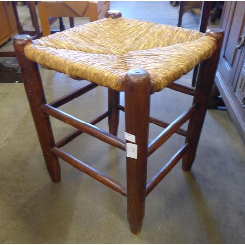 212 - A French beech and rush seated stool