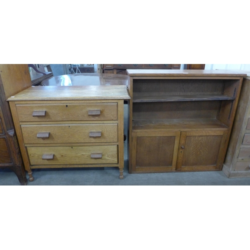 216 - An oak bookcase and a chest of drawers