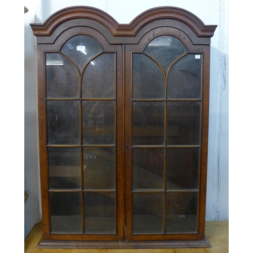 219 - A Queen Anne style walnut bookcase top