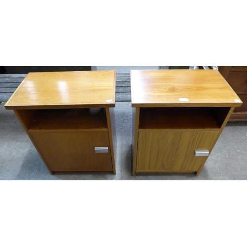 240 - A pair of teak bedside cabinets