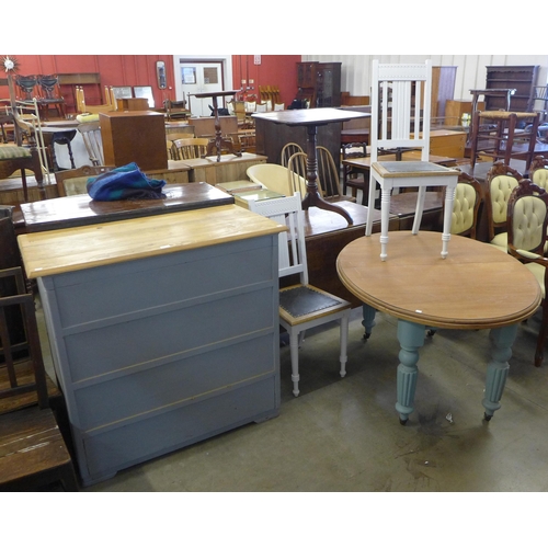 253 - A French painted commode, a dining table and two chairs