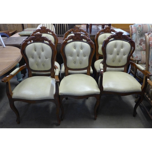 254 - A set of six Italian walnut dining chairs