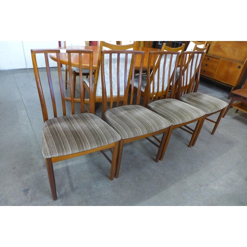 29 - A set of four McIntosh teak dining chairs