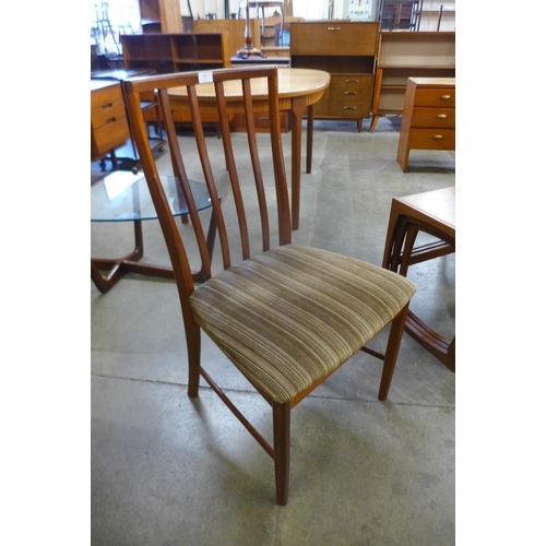 29 - A set of four McIntosh teak dining chairs