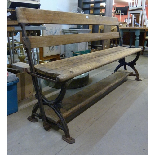 298 - A Victorian cast iron ended reversable platform bench