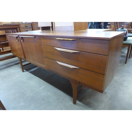 32 - A teak sideboard