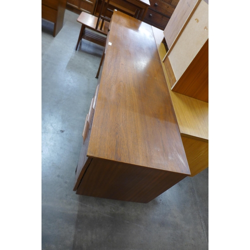 32 - A teak sideboard