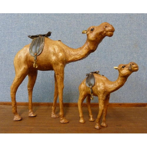 331 - Two Liberty style leather figures of camels