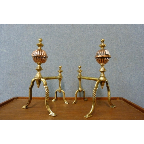 344 - A pair of Victorian Aesthetic Movement copper and brass andirons