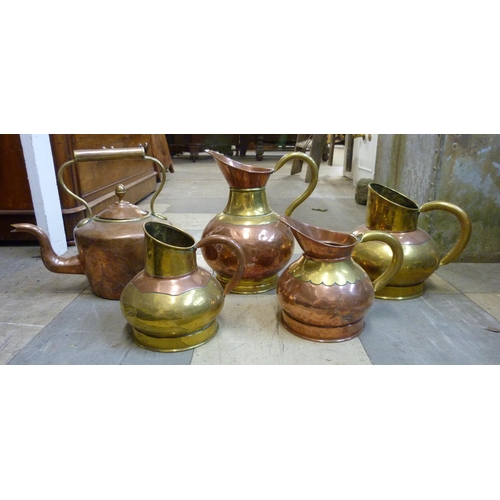 346 - Assorted brass and copper kettles and jugs