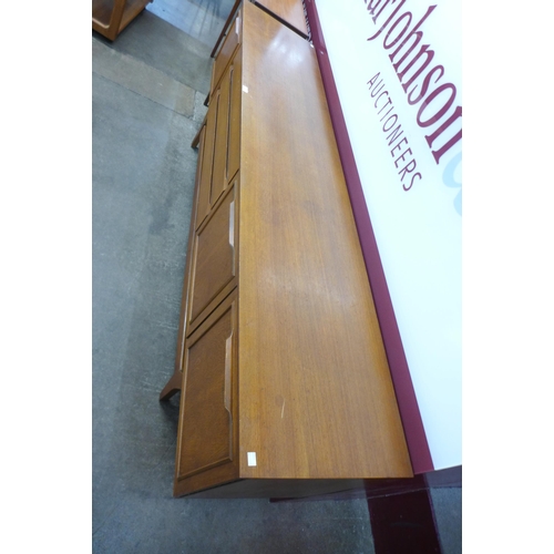 4 - A teak sideboard