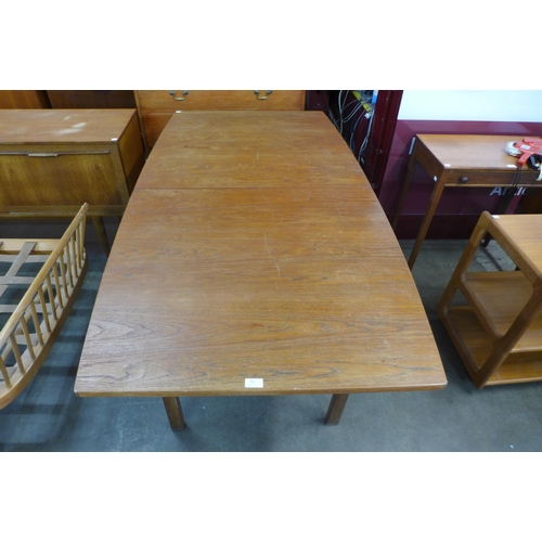 45 - A teak extending dining table