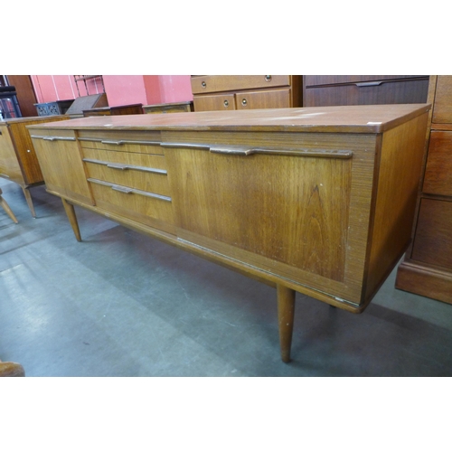 47 - A teak sideboard