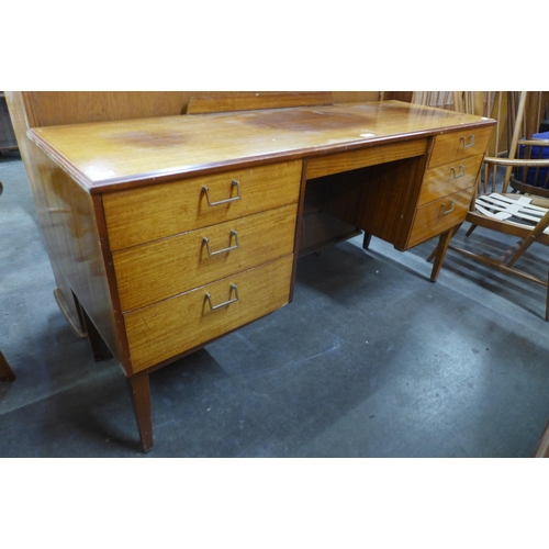 55 - A teak desk