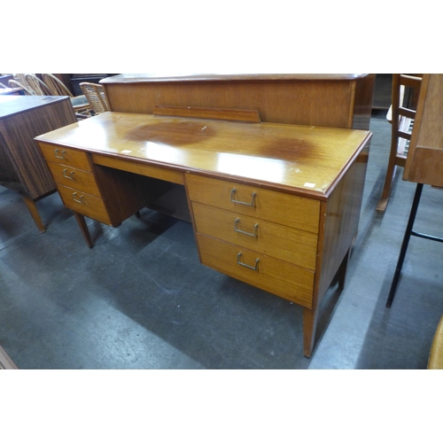 55 - A teak desk