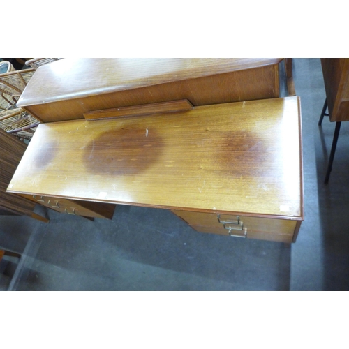 55 - A teak desk