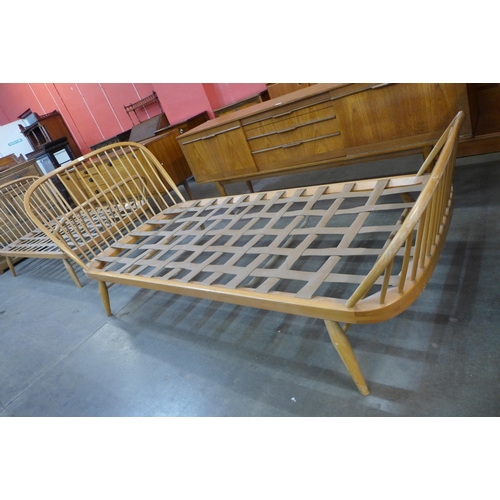 57 - A pair of Ercol Blonde beech single beds