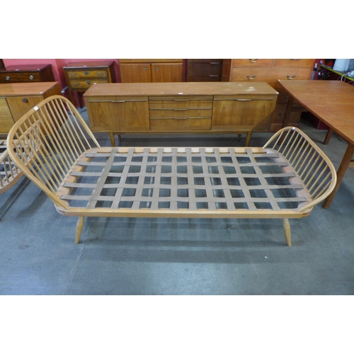 57 - A pair of Ercol Blonde beech single beds