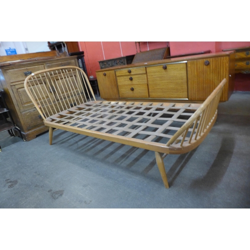 57 - A pair of Ercol Blonde beech single beds