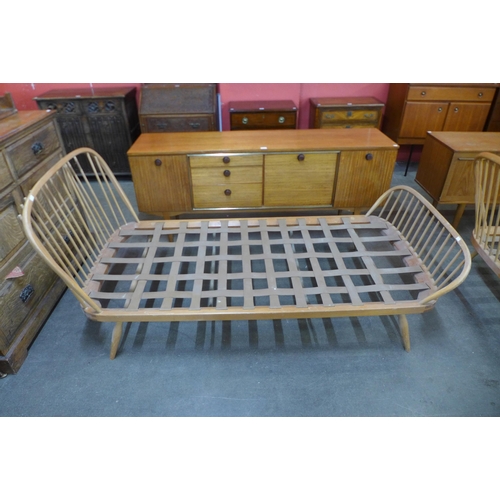 57 - A pair of Ercol Blonde beech single beds