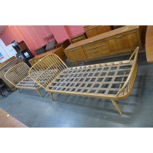 57 - A pair of Ercol Blonde beech single beds