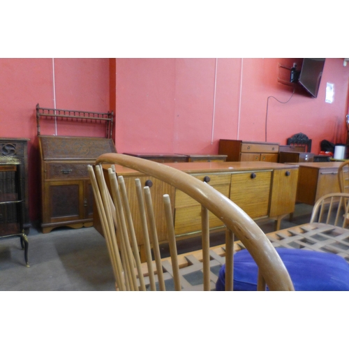 57 - A pair of Ercol Blonde beech single beds