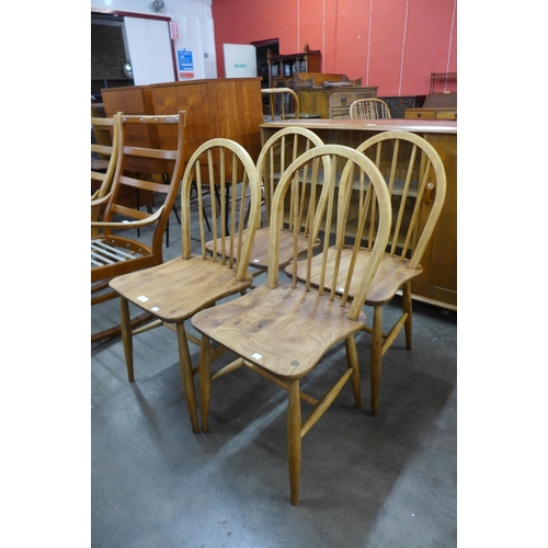 68 - A set of four Ercol elm and beech Windsor chairs