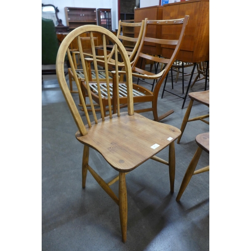 68 - A set of four Ercol elm and beech Windsor chairs