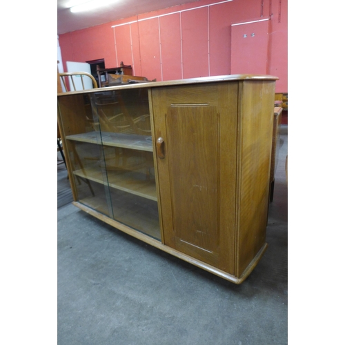 69 - A Priory oak bookcase