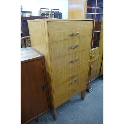 71 - A teak chest of drawers