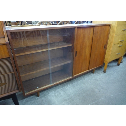 72 - A teak bookcase