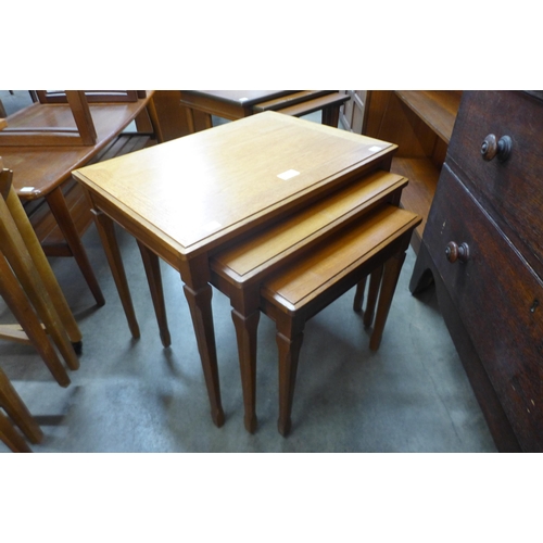 76 - A teak nest of tables