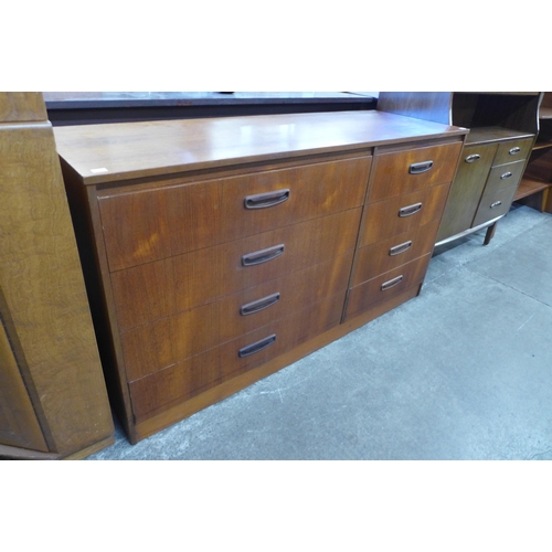 84 - A teak chest of drawers