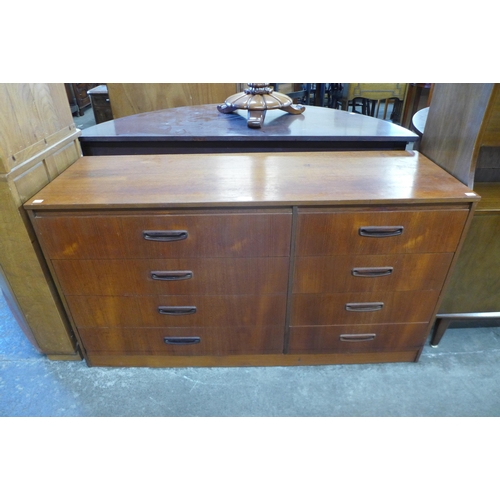 84 - A teak chest of drawers