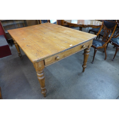 97 - A Victorian waxed pine single drawer farmhouse kitchen table