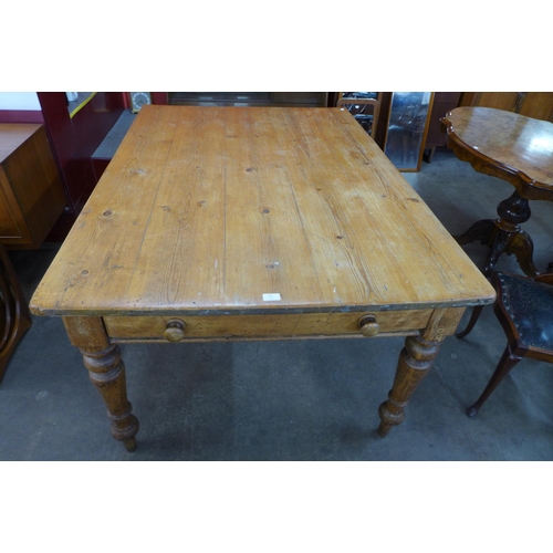 97 - A Victorian waxed pine single drawer farmhouse kitchen table