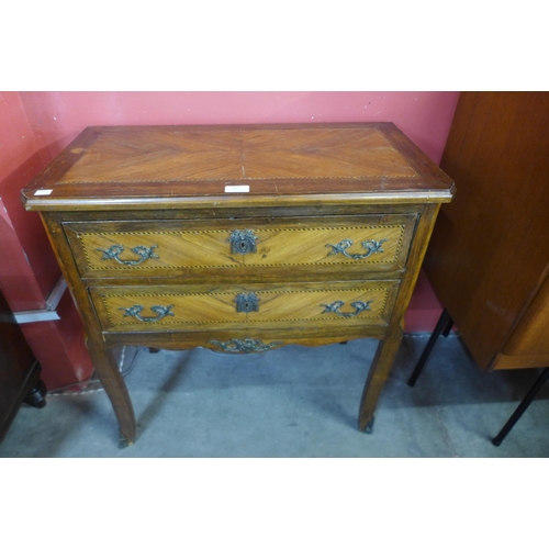 99 - A French Louis XV style inlaid rosewood petit commode