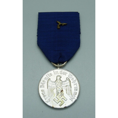 1016 - A WWII German Four Year Service medal