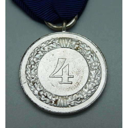 1016 - A WWII German Four Year Service medal